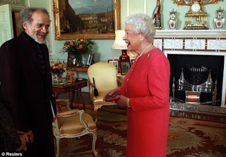 Queen shares a laugh w John Agard